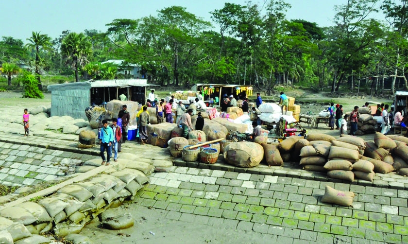 HATIA (Noakhali): Traders are waiting for river transport to carry their goods to different places of the country at Hatia Upazila as the country is out of blockade programme for last two days. This picture was taken on Saturday.