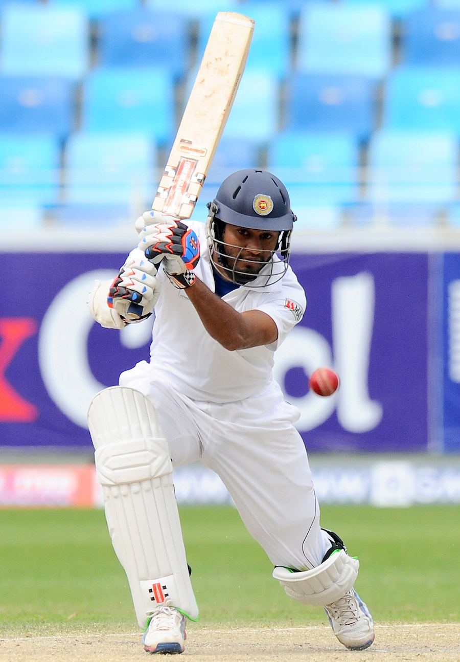 Sri Lankan batsman Dimuth Karunaratne plays a shot during the final day of the second cricket Test match between Pakistan and Sri Lanka at the Dubai International Cricket Stadium in Dubai on Sunday.
