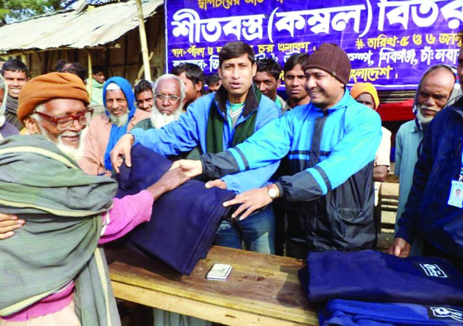 CHAPAINAWABGANJ: Warm clothes were distributed among clod -hit people of char areas of Shibganj Upazila organised by Gibas Jibon and Nodi Project-2 recently.