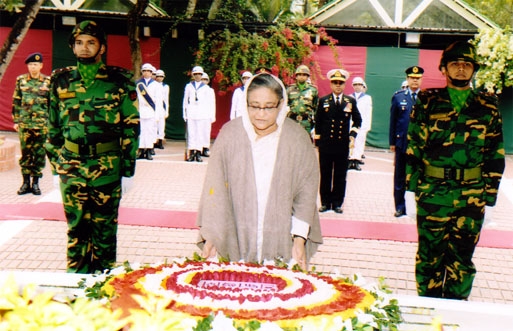 Prime Minister Sheikh Hasina placing wreaths at the Majar of Fathen of the Nation Bangabandhu Sheikh Mujibur Rahman at Tungipara on Wednesday.