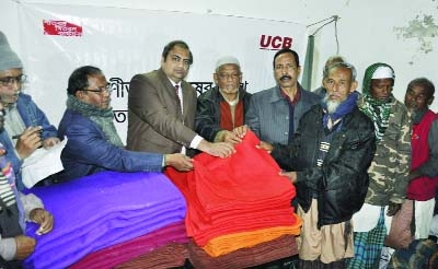 DINAJPUR: United Commercial Bank Ltd distributing blankets among the cold-hit people in Dinajpur on Thursday.