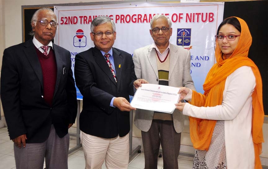 Dhaka University Pro-Vice Chancellor (Admin) Prof Dr Shahid Akhtar Hossain is seen distributing certificates among the participants of a week-long training program on "The Use, Maintenance and Trouble-shooting of Ultra-Violet, Visible and Infrared Spectr
