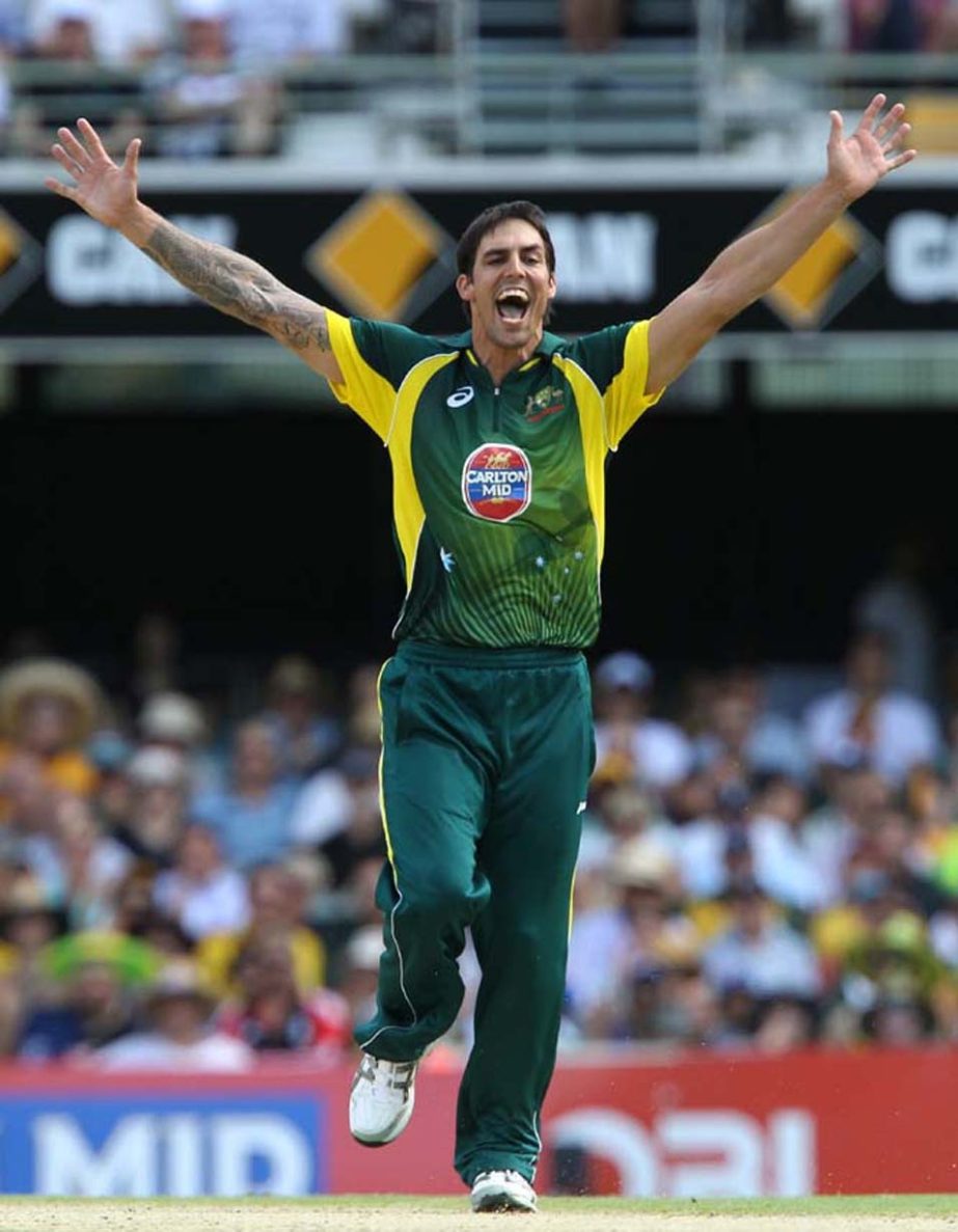 Australia's Mitchell Johnson celebrates after he got the wicket of England's Joe Root during the second One Day International cricket match between England and Australia at the Gabba in Brisbane, Australia on Friday.
