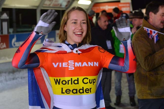 Winner Elizabeth Yarnold from Great Britain celebrates in the finish area after the women's Skeleton World Cup race in Innsbruck - Igls, Austria on Friday.