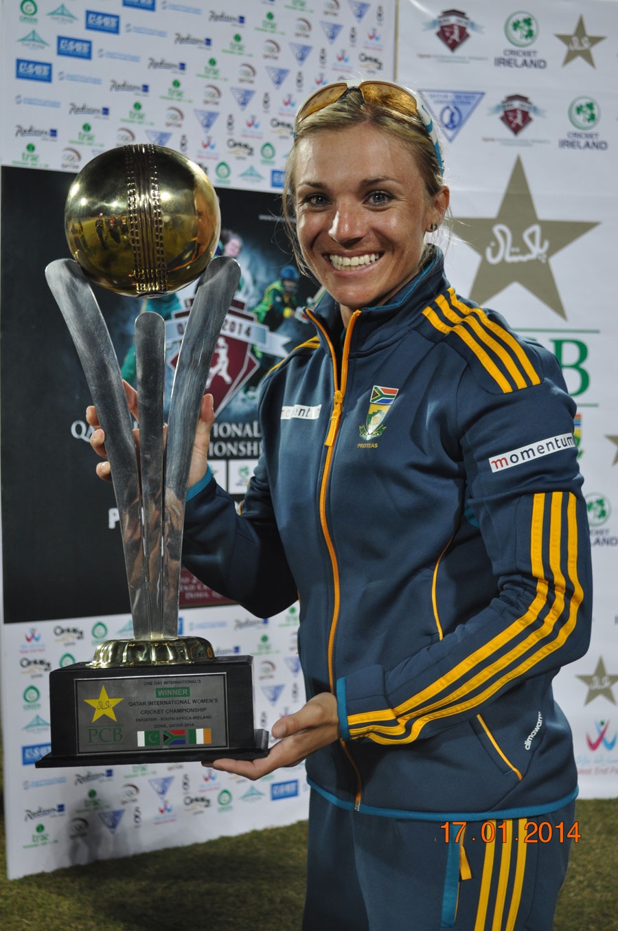 Mignon du Preez poses with the tournament trophy after the PCB Qatar Women's 50-over Tri-Series final match between Pakistan women and South African women at Doha on Friday.