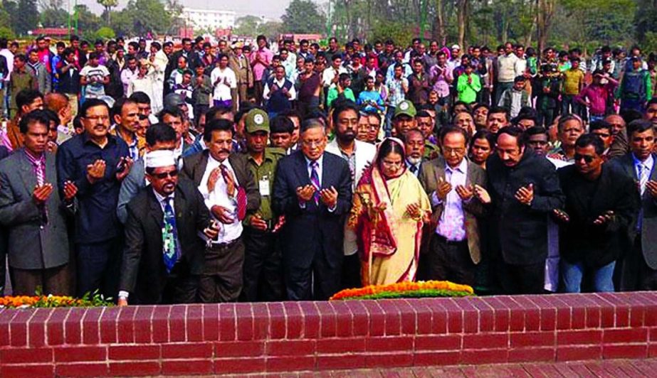 Leader of the Opposition Rawshan Ershad along with other JP MPs offering munajat after placing wreaths at Savar Mausoleum on Sunday.