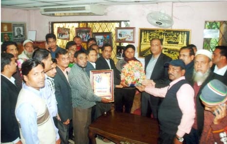 State Minister for Land Administration Ministry Saifuzzaman Chowdhury Javed receiving banquets at a reception programme on Sunday.