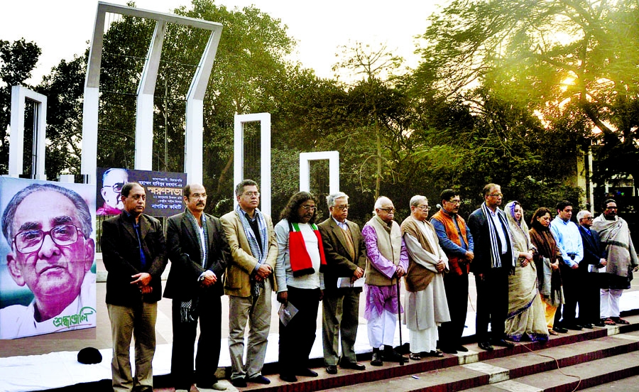 Distinguished persons stand in solemn silence commemorating former Chief Adviser of the Caretaker Government Justice Habibur Rahman at the Central Shaheed Minar premises in the city on Wednesday. Nagorik Committee organised the memorial meeting.