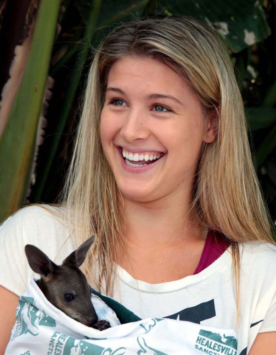 Eugenie Bouchard of Canada holds a baby wallaby in the players lounge at the Australian Open tennis championship in Melbourne, Australia on Wednesday. Bouchard will play China's Li Na in a semifinal today (Thursday).