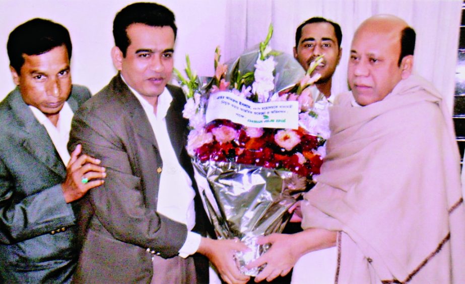 CEO of Kamal Agro Farm Golam Sarwar Liton greeted Advocate Kamrul Islam by giving bouquet at his official residence in the city's Mintoo road on Wednesday for his assumption of office as minister.