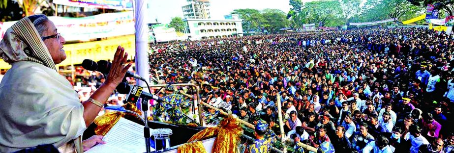 Prime Minister Sheikh Hasina addressing a mammoth public rally organised by Bangladesh Awami League at Shah Abdul Hamid Stadium ground in Gaibandha on Thursday. BSS photo