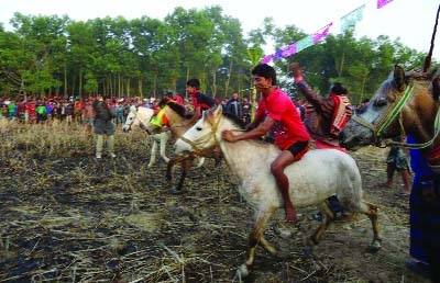 CHUNARUGHAT (Habiganj): A traditional horse race being held at Ranigaon in Chunarughat on Thursday.