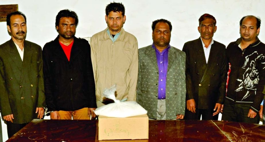 Six drug peddlers were arrested by DB police with six kilograms of cocaine from city's Nikunja area under Khilkhet Thana on Friday.