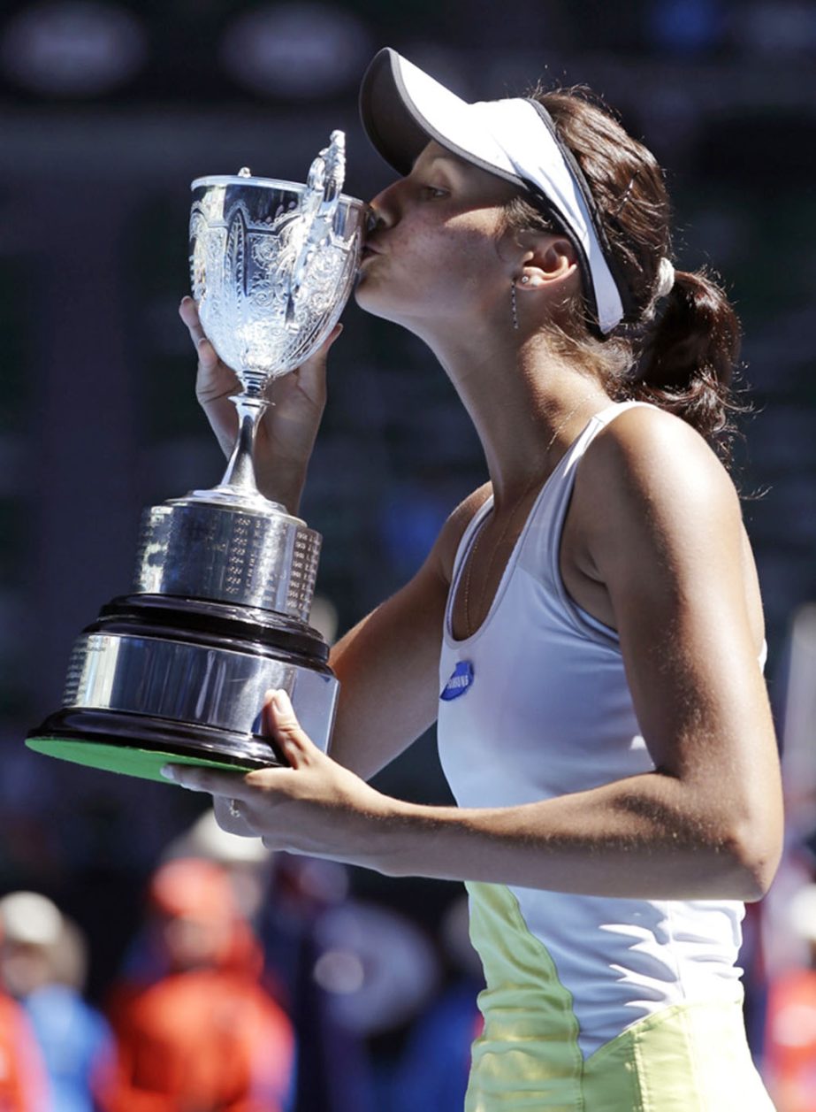 Elizaveta Kulichkova of Russia kisses the trophy after defeating Jana Fett of Croatia in their girls' singles final at the Australian Open tennis championship in Melbourne, Australia on Saturday.