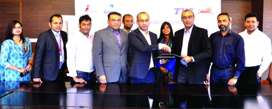 Mashrur Arefin, Deputy Managing Director and Chief Operating Officer of City Bank and Reaz Ahmed, Chief Operating Officer, TVS Auto Bangladesh signed an agreement to facilitate the City Bank American Express Card members installing facility in buying moto