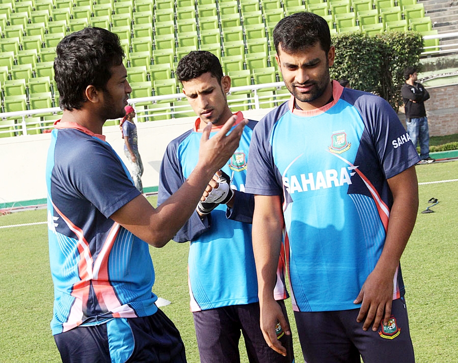 Shakib Al Hasan has a chat with Nasir Hossain and Tamim Iqbal during practice session at the Sher-e-Bangla National Cricket Stadium in Mirpur on Saturday.