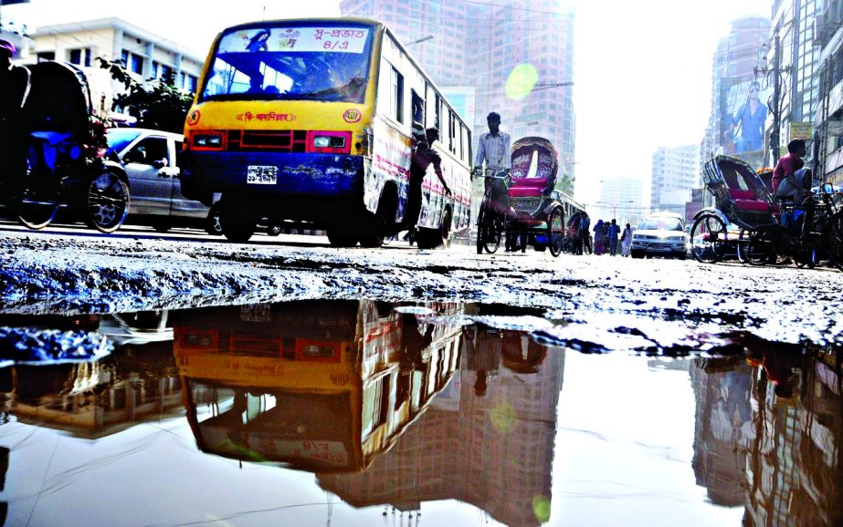 RAINS OR NOT! Waterlogging on the busy road at Malibagh area remains a cause of constant sufferings to commuters. This photo was taken on Sunday.