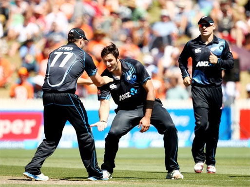 Hamish Bennett celebrates a wicket during the 4th ODI between New Zealand and India at Hamilton on Tuesday.