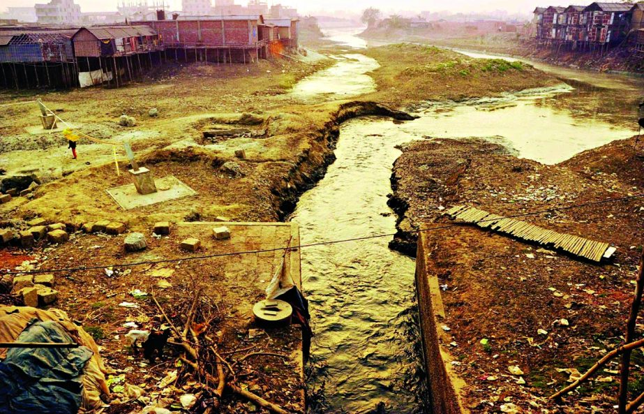 Dumping of waste from nearby Hazaribagh tannery factories to river Buriganga using feeder canal causing water pollution and environmental hazards to turn into a dead river. This photo was taken on Tuesday.