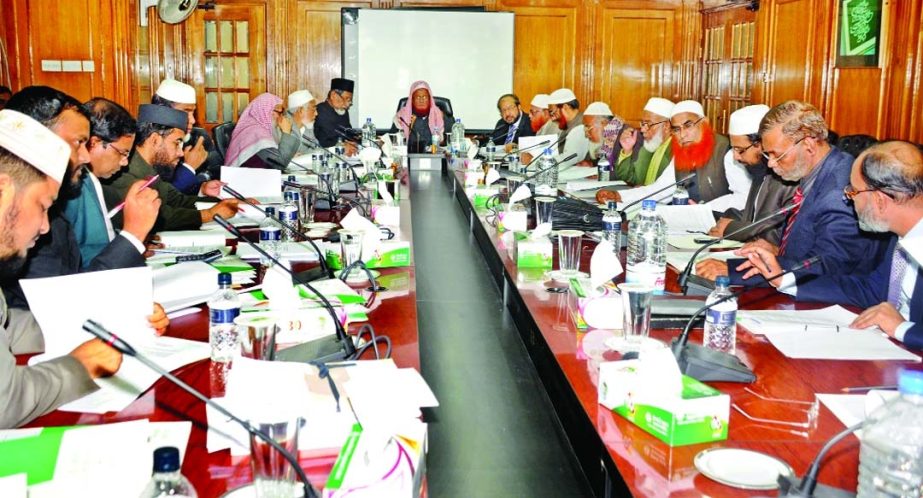 Mufti Sayeed Ahmad, Vice Chairman of the Shari`ah Supervisory Committee of Islami Bank Bangladesh Limited presiding over a committee meeting held at Islami Bank Tower on Tuesday.