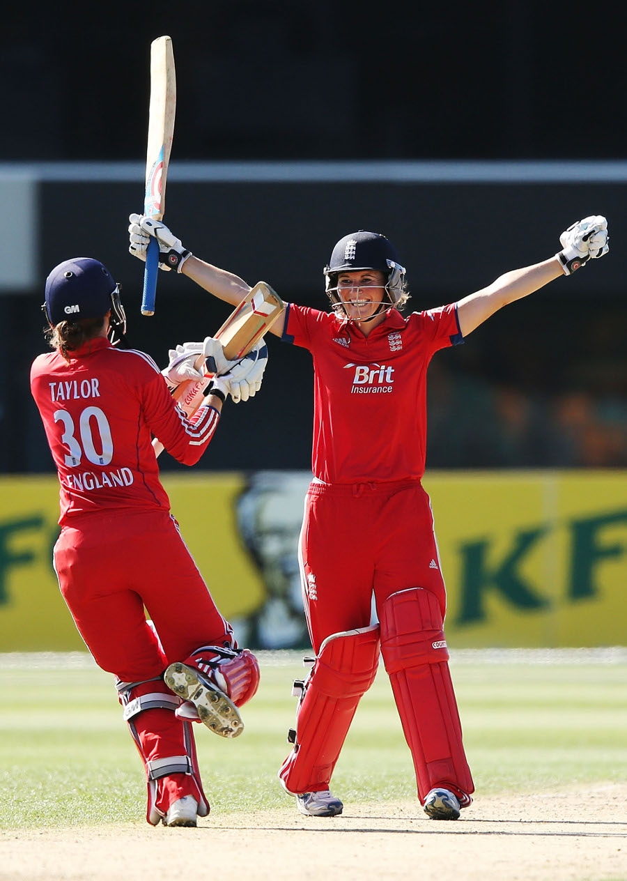 Charlotte Edwards starts the celebrations after hitting the winning boundary during the 1st Women's T20i between Australia and England at Hobart on Wednesday.