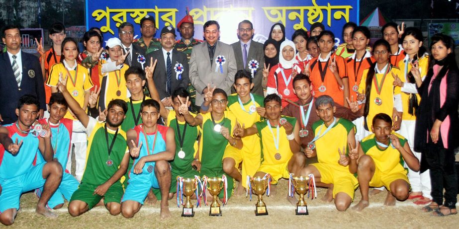 Area Commander, Head Quarter Log Area Major General Mizanur Rahman Khan with the winners of the Annual Sports Competition of Adamjee Cantonment College pose for a photo session at the College Ground in Dhaka Cantonment on Wednesday.