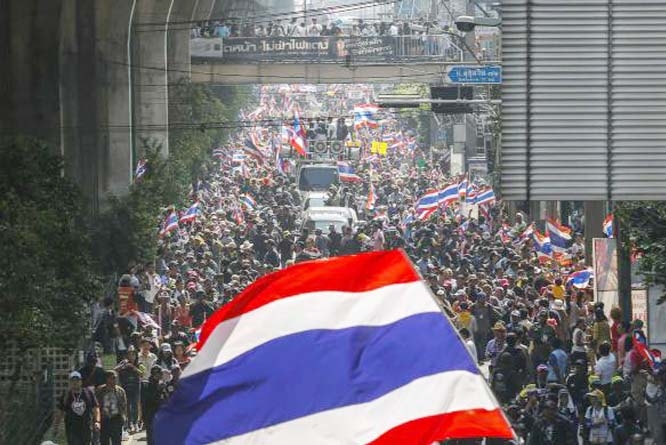 Anti-government protesters take part in a rally in central Bangkok on Thursday.