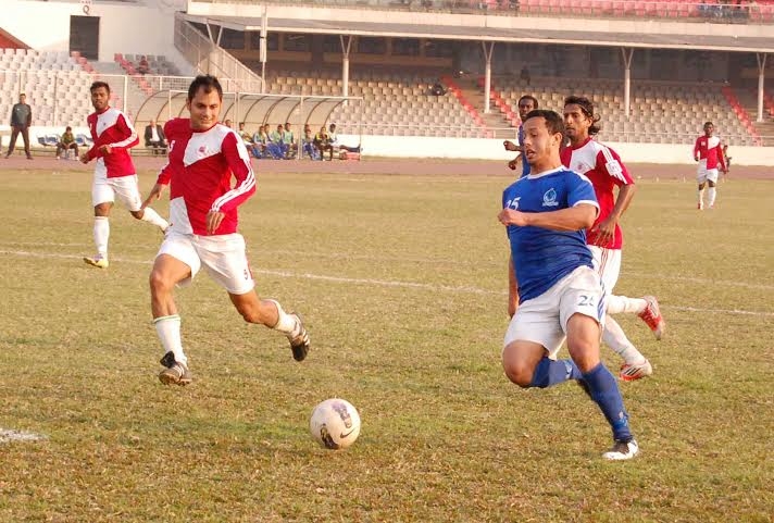 A moment of the football match of the Bangladesh Premier League between Sheikh Russel Krira Chakra and Team BJMC at the Bangabandhu National Stadium on Thursday.