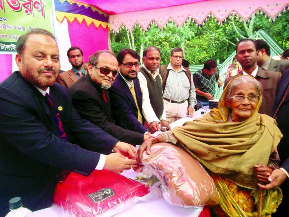 As Corporate Social Responsibilities Mustafa Anwar, Vice Chairman of Islami Bank Bangladesh Limited distributing warms clothes among the cold-stricken poor people of Tangail recently. Md. Motiar Rahman, Senior Vice President and Head of Mymensingh Zone o