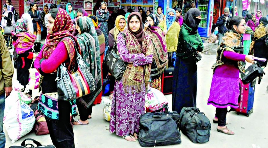 Students of Rajshahi University vacating their dormitories on Monday morning as directed by the authority following Sunday's violence. Many students including girls remained stranded at bus terminals due to lack of transports at the early morning.