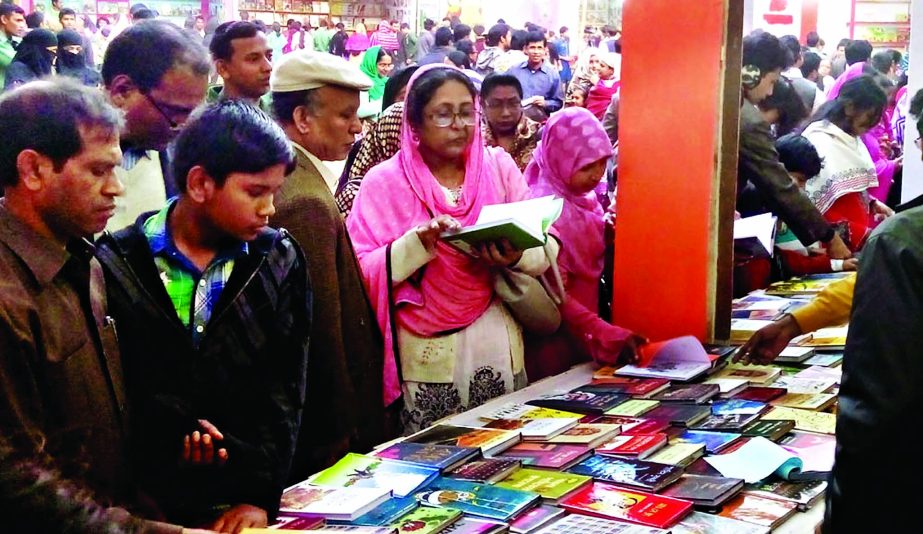 Rush at the Ekushey Boi Mela on the 4th day of Tuesday.