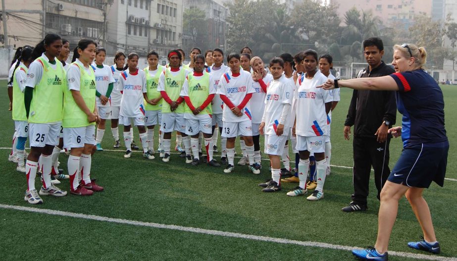 Linda Hamilton (extreme right), a member of the USA team, the champions of the Women's World Cup Football 1991 giving instructions to Bangladesh Women's (Age Group) Football team at the BFF Artificial Turf adjacent to the Bangladesh Football Federation