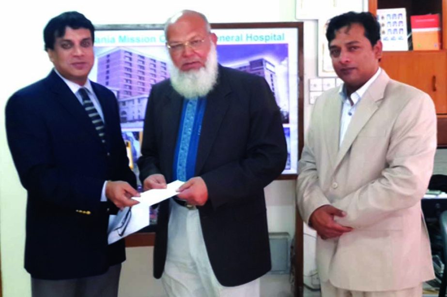 Md Asiful Karim, Managing Director (current charge) of Hajj Finance Company Limited handing over a cheque to Qazi Rafiqul Alam, President of Dhaka Ahsania Mission for rehabilitating victims of attacks during the recent political confrontation.