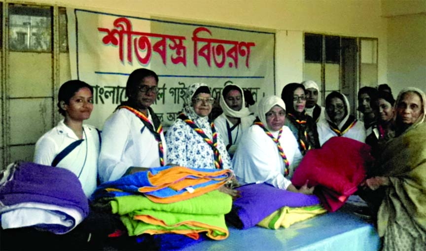 BARISAL: Bangladesh Girls Guide, Barisal distributed warm clothes among the distressed people in Barisal yesterday.