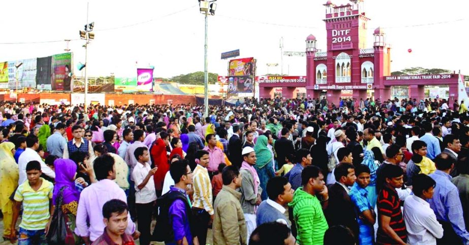 Tens of thousands of people thronged the Dhaka International Trade Fair (DITF-2014) at the fag-end of the month-long show on Friday. Photo : Moin Ahamed