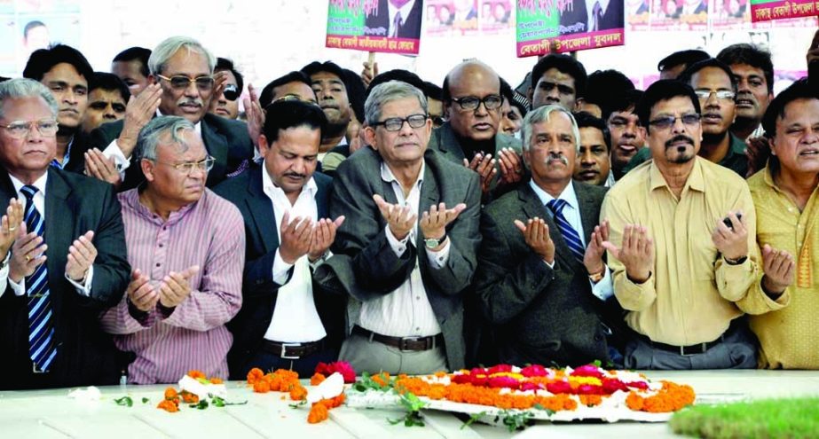 BNP Acting Secretary General Mirza Fakhrul Islam Alamgir along with party leaders who released from jail recently offering munajat after placing floral wreaths at the Mazar of Shaheed President Ziaur Rahman in the city on Saturday.