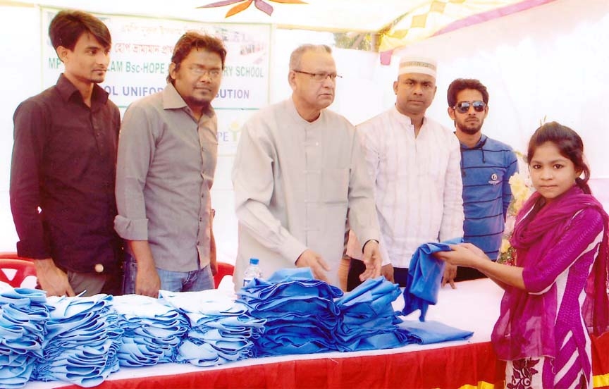 Former MP Nurul Islam BSc distributing school uniforms among the students of mobile primary schools at a function in Chittagong yesterday.