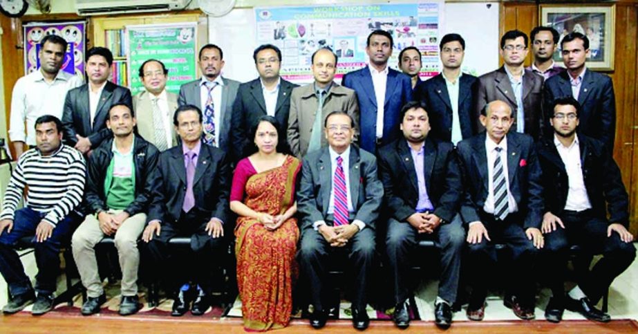 Chairman and Managing Director of Rapport Bangladesh Limited Dr M Mosharraf Hossain (sitting 4th from right), among others, at a training workshop on â€˜Communication skills' organized recently by Rapport Bangladesh Ltd at its seminar hall in the cit