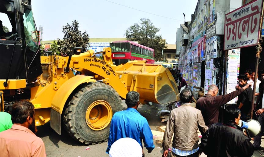 Dhaka South City Corporation evicted illegal structures in Gulistan area on Monday.