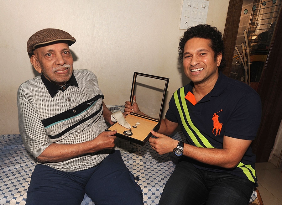 Sachin Tendulkar and his coach Ramakant Achrekar pose with the Bharat Ratna in Mumbai on Monday.