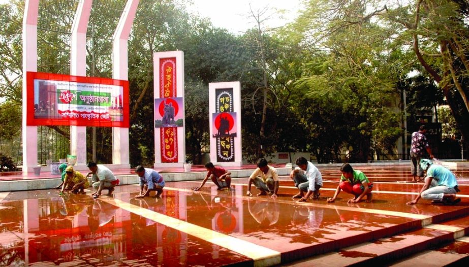 Labourers are engaged in cleaning the Central Shaheed Minar ahead of International Mother Language Day and Amar Ekushey. The snap was taken on Wednesday.
