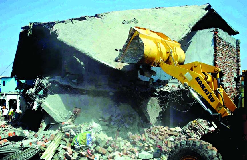 Rajuk authority conducted an eviction drive over illegal structures at city's Badda area on Wednesday.