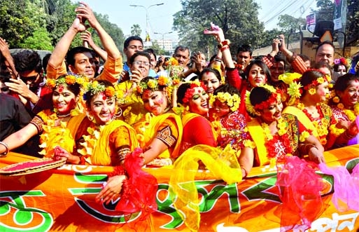 Pahela Falgun: Youngsters celebrating the first day of Pahela Falgun in a festive mood with joys and colours on Dhaka University Campus on Thursday.
