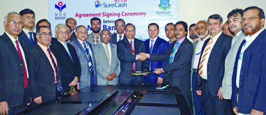 Mohammed Nurul Amin, Managing Director and CEO of NCC Bank Ltd and Md Sabur Khan, Chairman of Daffodil International University, signed a Memorandum of Understanding to facilitate students pay their admission, registration, semester fees and other univers