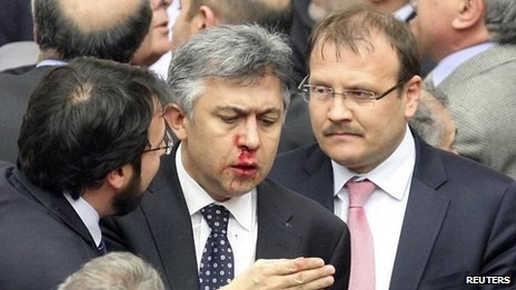 Turkish MPs pass judicial reforms amid brawl