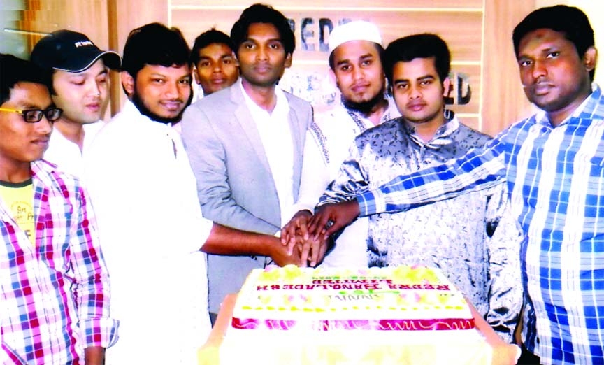 Md Kamrul Islam Rasel, Managing Director of Redra Bangladesh Limited inaugurating annual feast of the company by cutting cake at its head office in the city recently.
