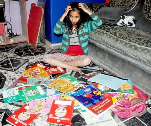 The pressing burden of books: Too many books for too young a learner! Would our education administrations use their common sense to make learning painless for these helpless kids?