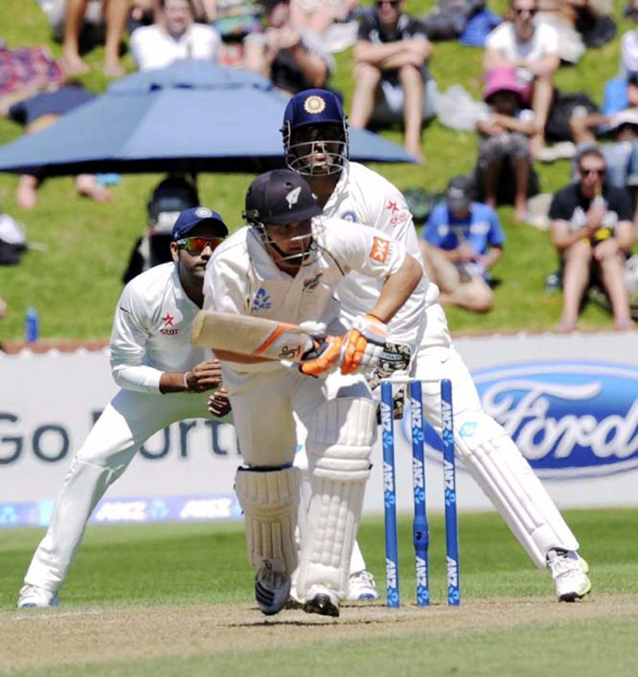 New Zealand's BJ Watling sets off in a run against India on the third day of the second cricket Test at Basin Reserve in Wellington, New Zealand on Sunday.