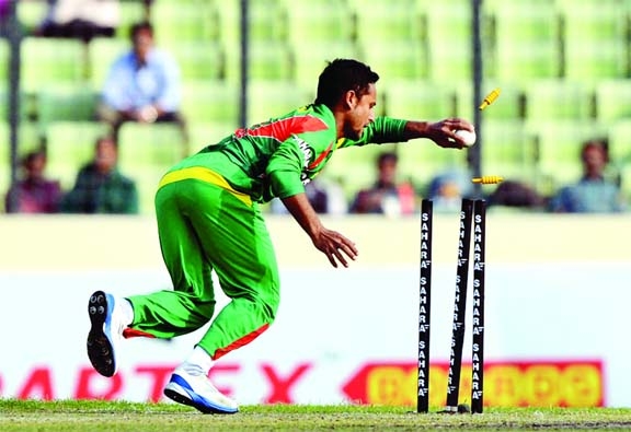 Arafat Sunny removes the stumps to effect the run-out of Dinesh Chandimal during the 1st ODI between Bangladesh and Sri Lanka at Mirpur on Monday.