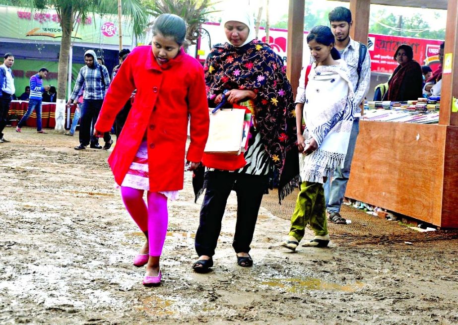 Book lovers faced discomfort as the ground of Monday's Boi Mela became slightly muddy due to sudden drizzling in the month of Falgun.
